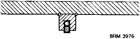 Shows mounting bracket for rear suspension control arm