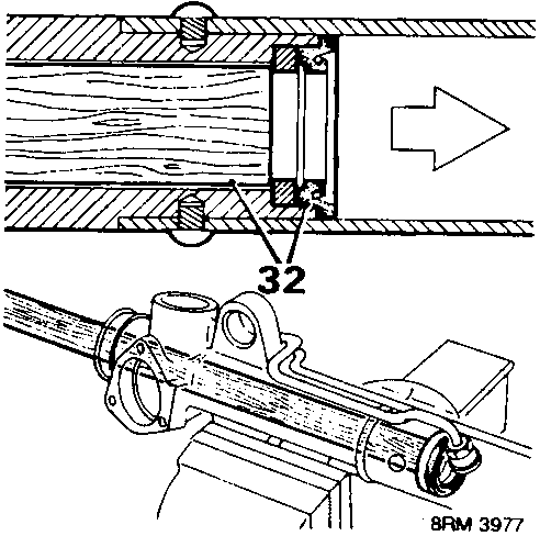 Diagram showing component 32, a support ring being removed from a rack tube using a wooden dowel.