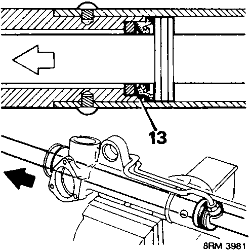 Cross-section diagram showing the rack being inserted into the rack tube, with arrows indicating direction of movement. Part 13 indicates the tie-rod connection point.