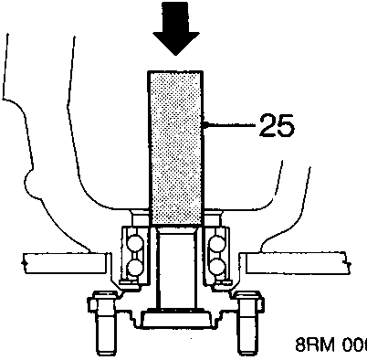 Diagram showing hub being pressed out of drive flange using a drift
