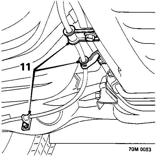 Diagram showing handbrake cable clips attached to body and suspension arm, callout 11