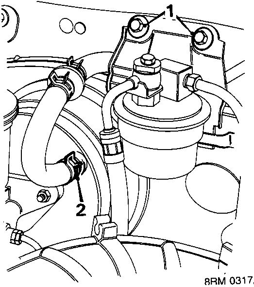 Diagram showing bolts securing fuel filter to bulkhead and clip securing servo hose to servo