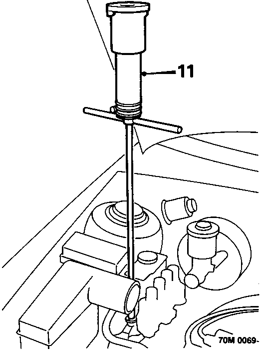 Diagram showing component 11, a 'T' wrench tool fitted to the bleed screw on the accumulator reservoir