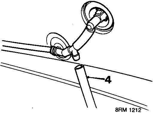Technical drawing showing a washer tube connection point on the bonnet, with a 'T' piece connector indicated by callout number 4.
