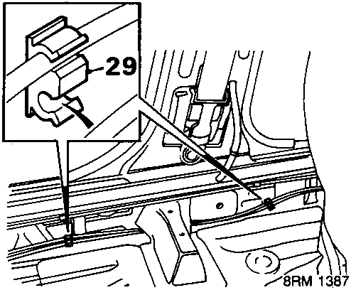 Diagram showing carpet being released from driver's door sill and a cable being released from sill clips, with callout number 29.