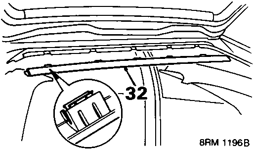 Diagram showing removal of headlining finisher from taildoor aperture, with callout 32.