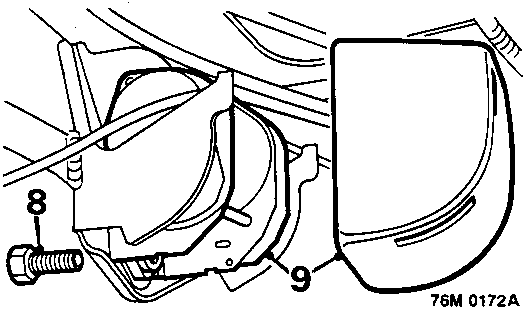 Diagram showing the seat belt reel mounting bolt (8) and the cover (9) on the reel assembly.