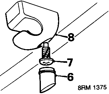 Diagram showing removal of blanking plug, clip screw, and sun visor clip