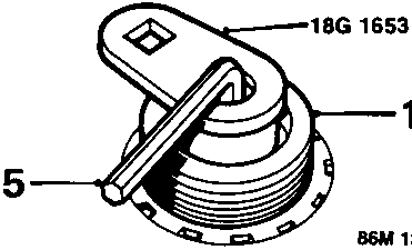 Diagram of alternator pulley removal using tool 18G 1653, with callout numbers 15, 16