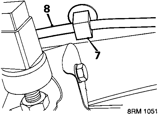 Diagram showing the release of a clip securing a coaxial cable above the steering column, with callout numbers 7 and 8 identifying the clip and cable.